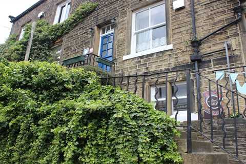 This Tiny TV Cottage Just Got Real Cheap (And Yes, You'll Know It)